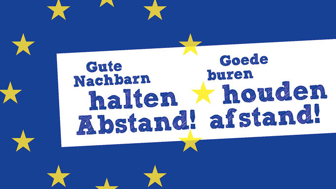 Europaflagge mit Texten auf deutsch und niederländisch