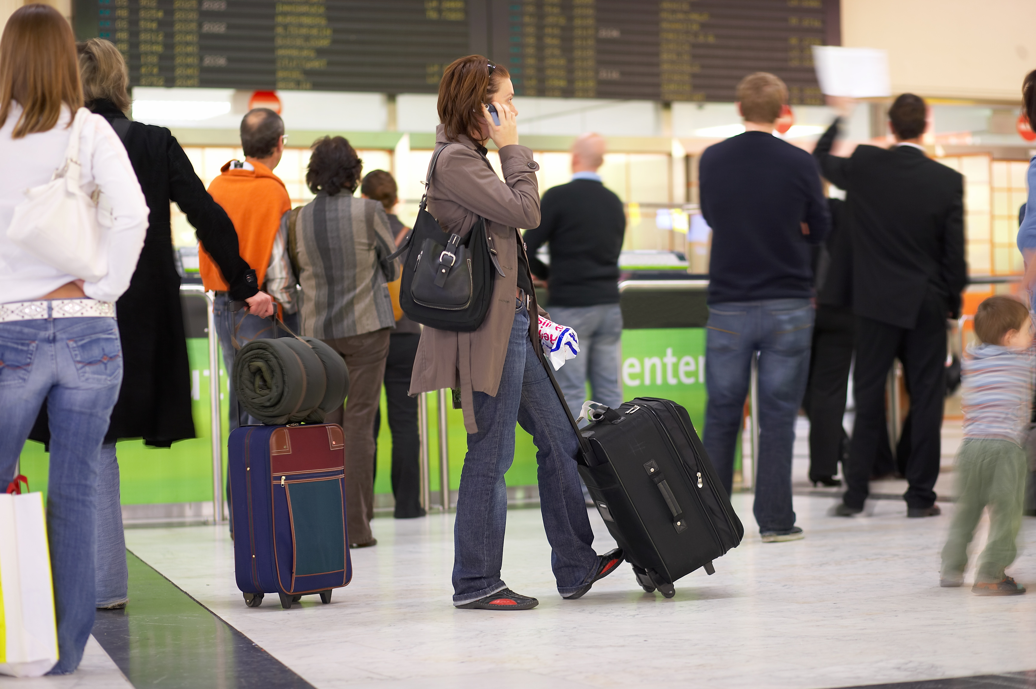 Passagiere beim Check-In